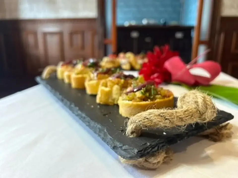 Canapés served on slate in the dining room