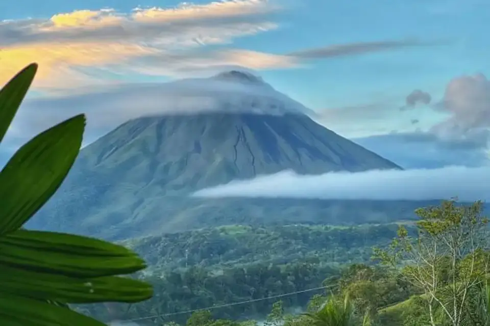 Arenal Volcano rising above the rainforest
